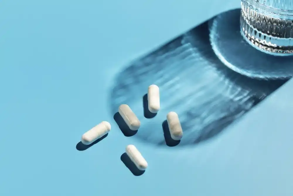 Dietary supplements with a cup of water