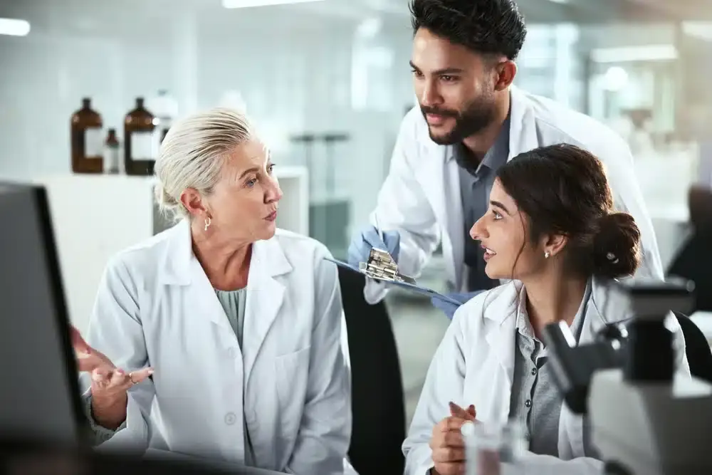professionals in lab discussing about supplements