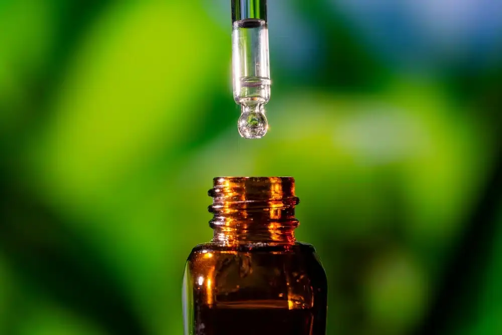 glass-pipette-liquid-above-bottle